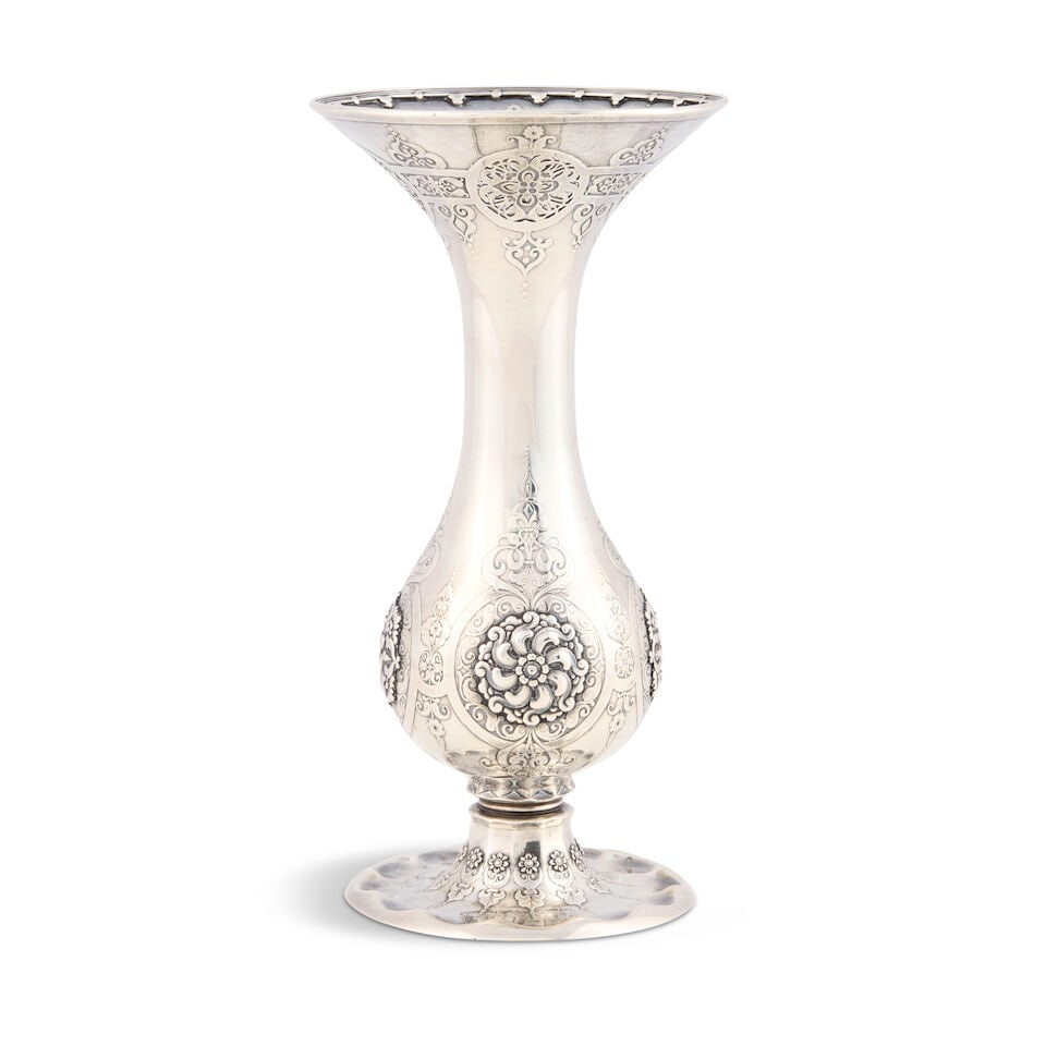 Tiffany & Co. Sterling Silver Vase,: Tiffany & Co. Sterling Silver Vase, New York, 1875-91, with a flared reticulated rim and allover acid-etched and embossed Persian-style motifs, ht. 7 5/8 in., approx. 9.0 troy oz. Footnotes: Provenanc