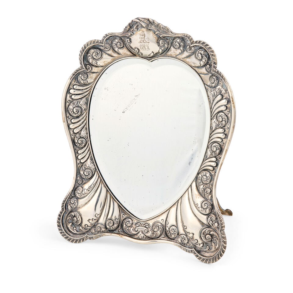 Howard & Co. Sterling Silver Mirror Frame,: Howard & Co. Sterling Silver Mirror Frame, New York, late 19th century, with monogrammed armorial to upper cartouche, ht. 12 1/2 in. Footnotes: Provenance: Collection of Kathy Field Malavasic For furt