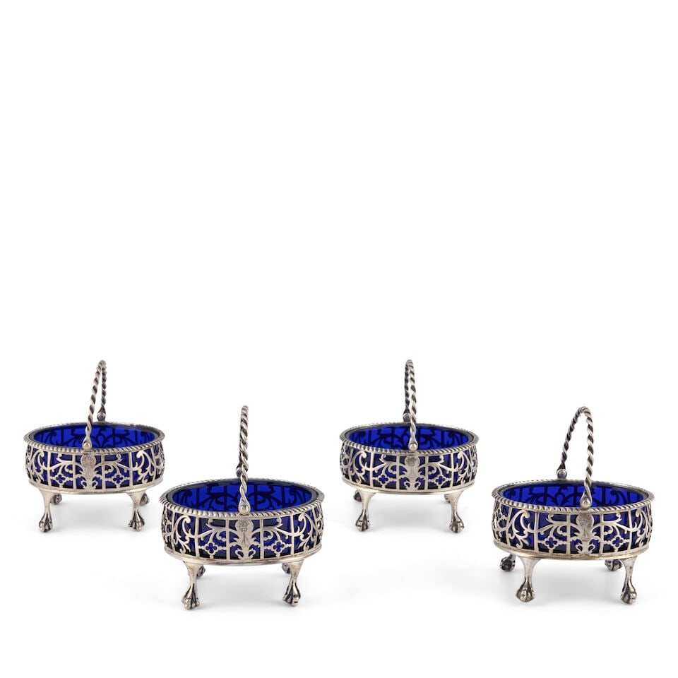 Set of Four George III Sterling Silver Salt Cellars,: Set of Four George III Sterling Silver Salt Cellars, London, 1768-69, David & Robert Hennell, makers, crested, pierced bodies with gadrooned rim and rope-twist handles, raised on ball and claw feet, w