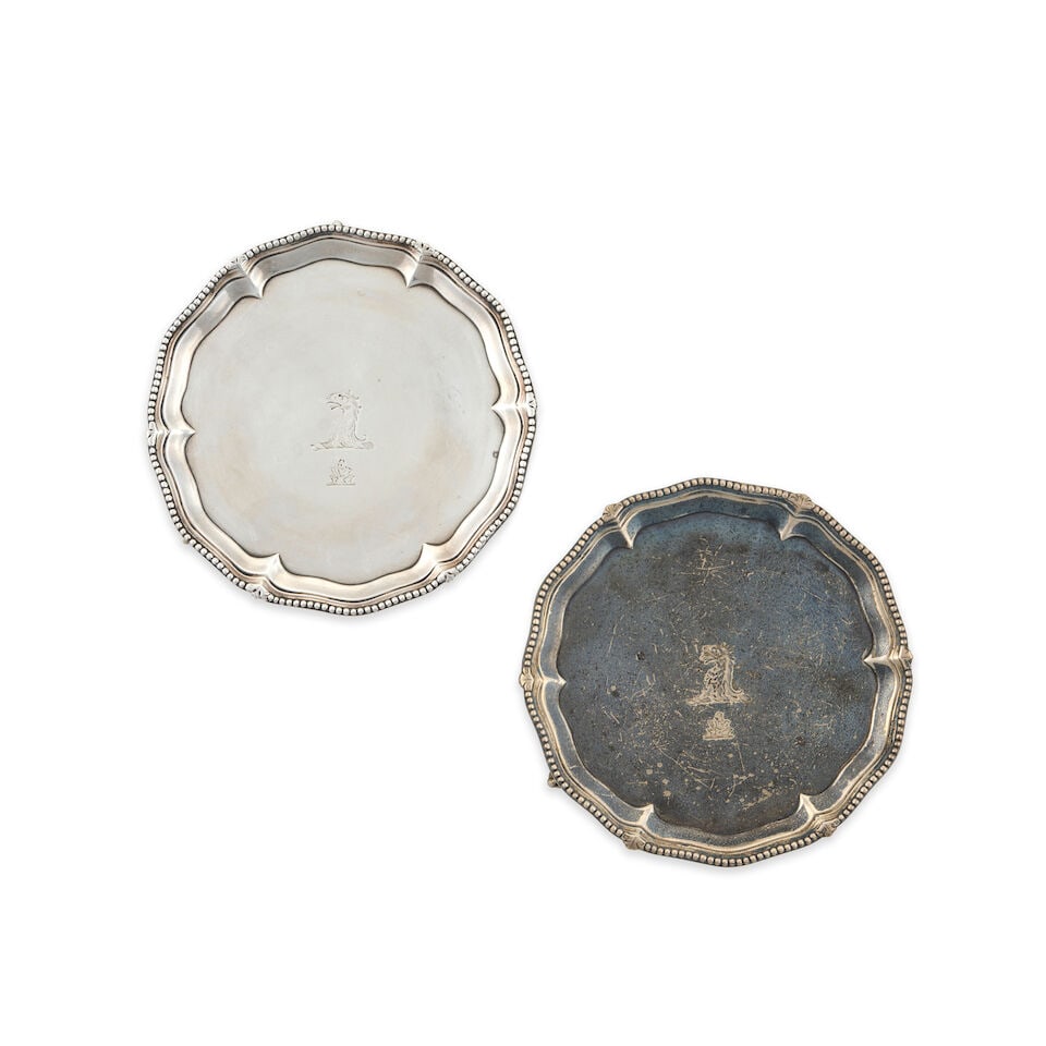 Pair of George III Sterling Silver Salvers,: Pair of George III Sterling Silver Salvers, London, 1774, maker's mark 'IC' separated by a pellet, of shaped circular form with beaded rim, crested, dia. 6 1/4 in., approx. 15.20 troy oz. Footnotes: P