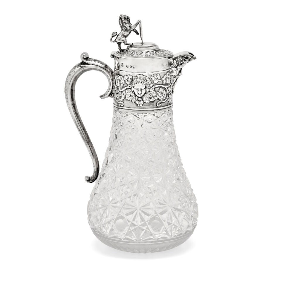 Victorian Silver-mounted Claret Jug,: Victorian Silver-mounted Claret Jug, London, 1890, Horace Woodward & Co., maker, the lid with a lion rampant finial, the collar with Bacchanalian masks, ht. 11 1/2 in. For further information on this 