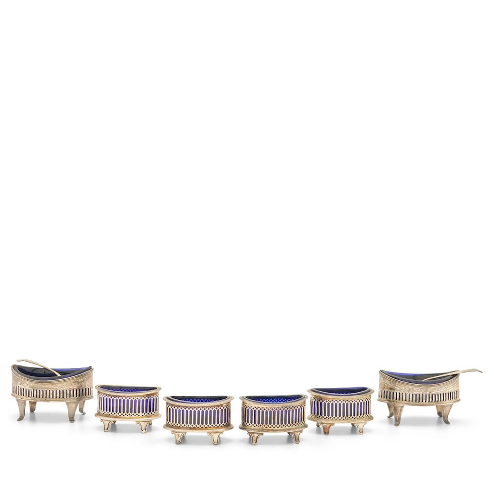 Six English Salt Cellars,: Six English Salt Cellars, four by Haseler Brothers, Chester, 1902, ht. 1 1/2, lg. 2 3/4; two by William Abdy II, maker, London, 1795, the sloped rim above a pierced body, crested, the underside inscri