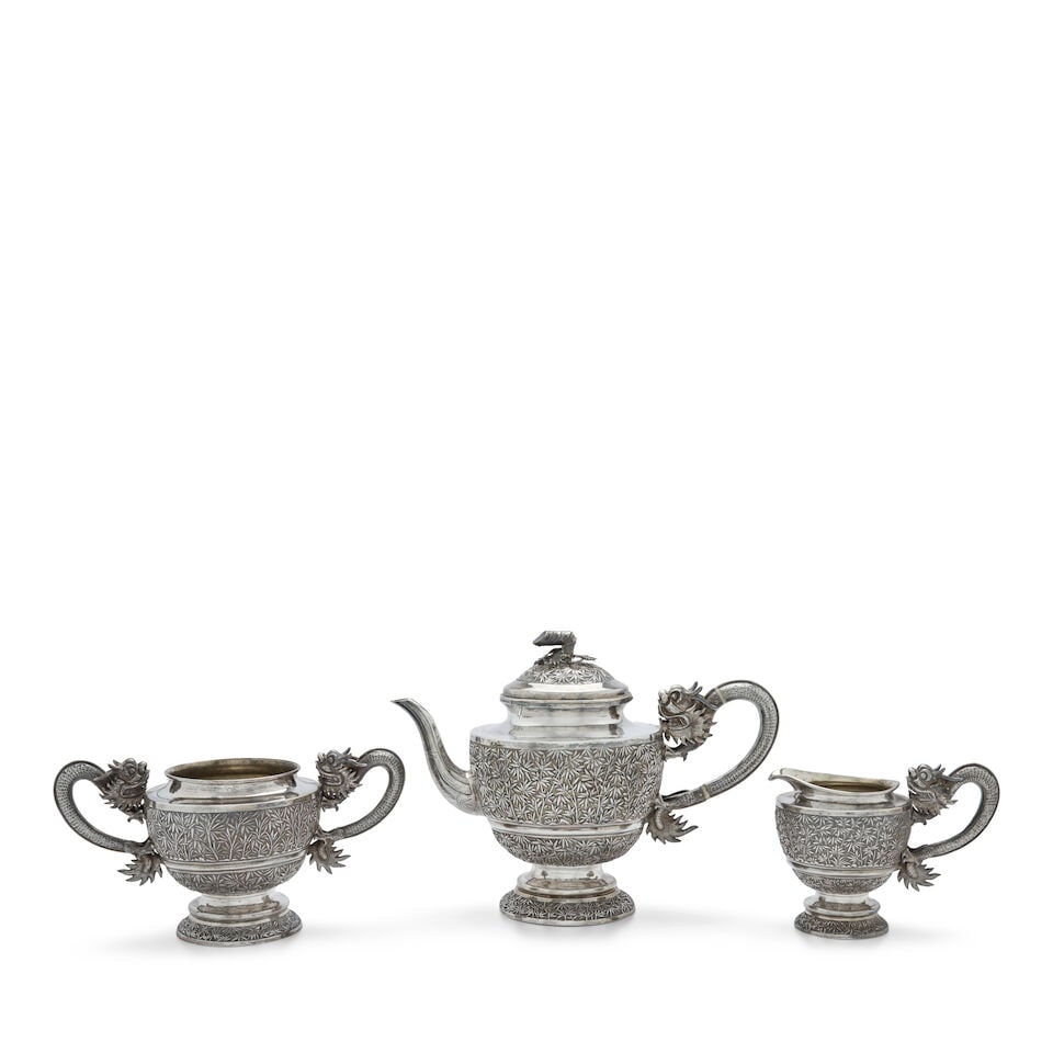 Chinese Export Silver Tea Set,: Chinese Export Silver Tea Set, Gem Wo, Canton, circa 1850-1900, includes teapot, ht. 8 1/2; creamer, ht. 4 3/4; and sugar bowl (lacking cover), lg. over handles 10 in.; the pieces decorated with bambo