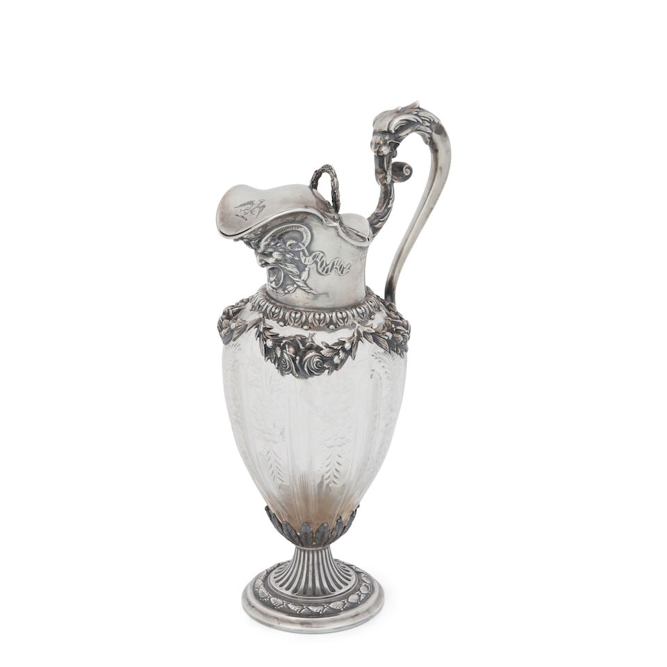 Durgin Sterling Silver-mounted Ewer,: Durgin Sterling Silver-mounted Ewer, Concord, New Hampshire, late 19th century, the hinged lid crested, with etched glass, ht. 9 1/4 in. For further information on this lot please visit Bonhams.com Fo