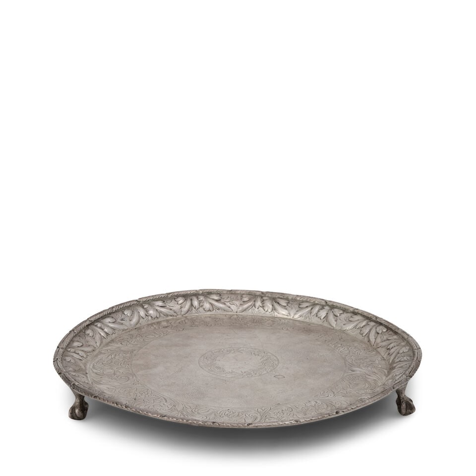 S. Kirk 11oz Silver Salver,: S. Kirk 11oz Silver Salver, Baltimore, Maryland, 1846-1861, circular with a feather edge rim and foliage repousse border, the center cartouche left blank, on ball and claw feet, dia. 10 1/2 in.;
