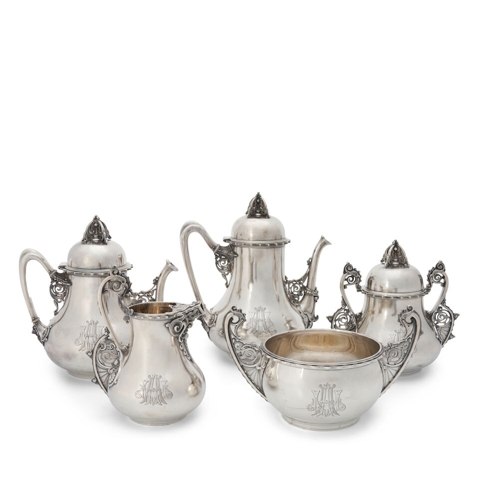 Tiffany & Co. 'Mooresque' Pattern Sterling Silver Coffee and Tea Service,: Tiffany & Co. 'Mooresque' Pattern Sterling Silver Coffee and Tea Service, New York, 1854-1870, monogrammed, of baluster form, each piece with scrolling openwork details against a matte finished ground