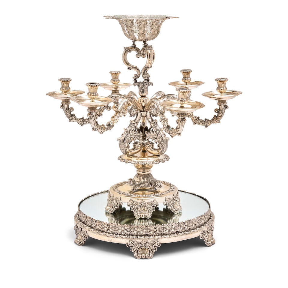 Swedish Silver Centerpiece,: Swedish Silver Centerpiece, Stockholm, 1842, Adolf Zethelius, maker, on a slightly domed circular base raised on shell and scroll feet, the knopped socle with scrolled supports, the six curved branche