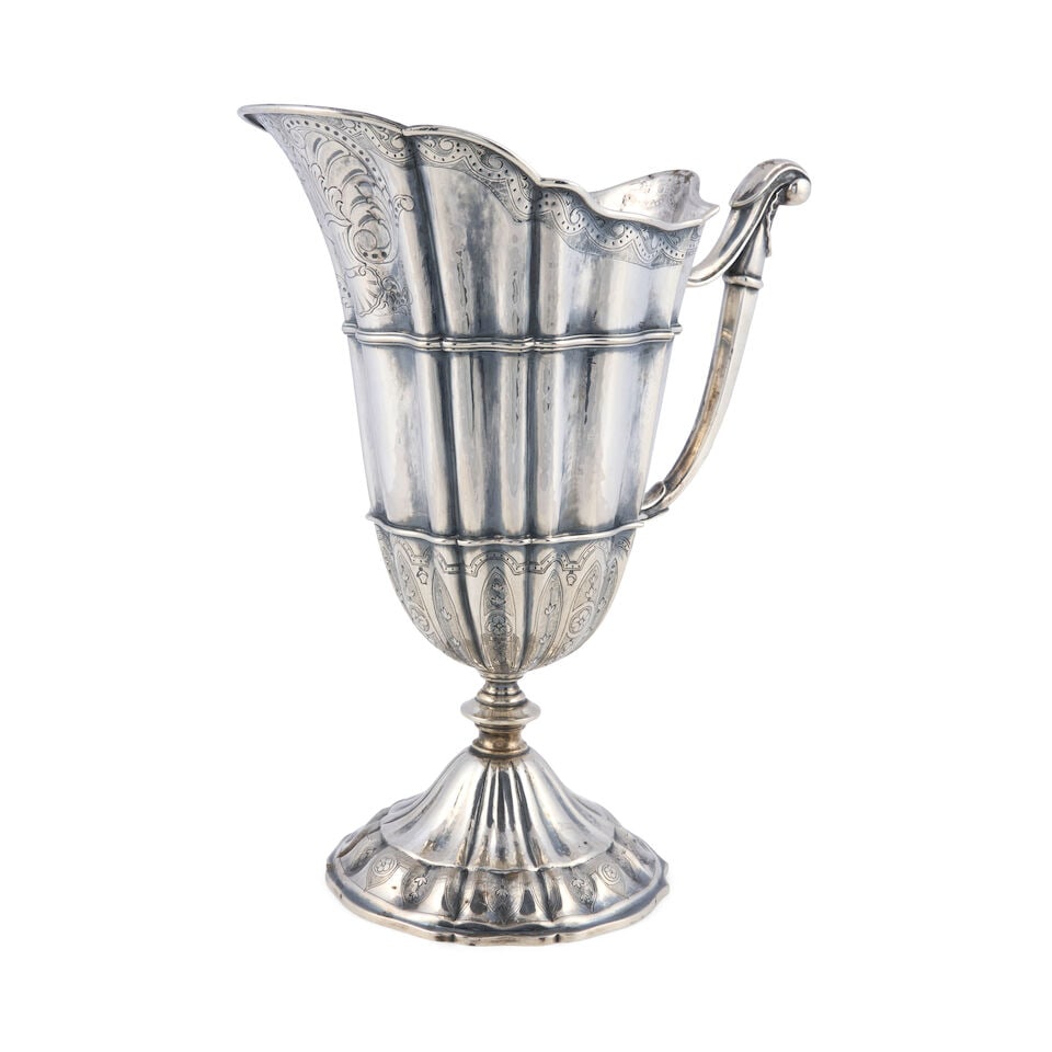 Buccellati Sterling Silver Water Pitcher,: Buccellati Sterling Silver Water Pitcher, Milan, mid-20th century, of fluted form with a double-banded body, ht. 11 1/4 in., approx. 29.80 troy oz. For further information on this lot please visit Bon