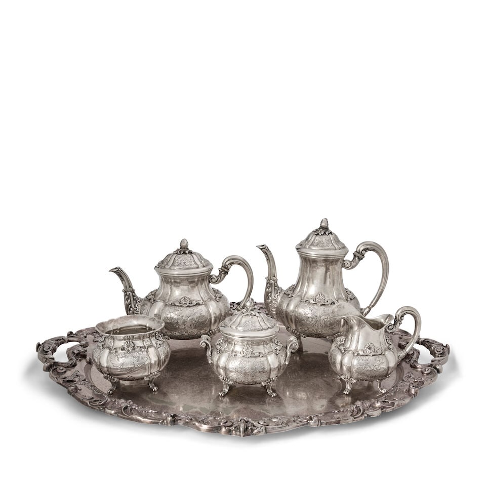 Italian .800 Silver Coffee and Tea Service with Tray,: Italian .800 Silver Coffee and Tea Service with Tray, Florence, mid-20th century, Fratelli Peruzzi, makers, the pieces of lobed construction, with applied shell and scroll motif, includes coffeepot, h