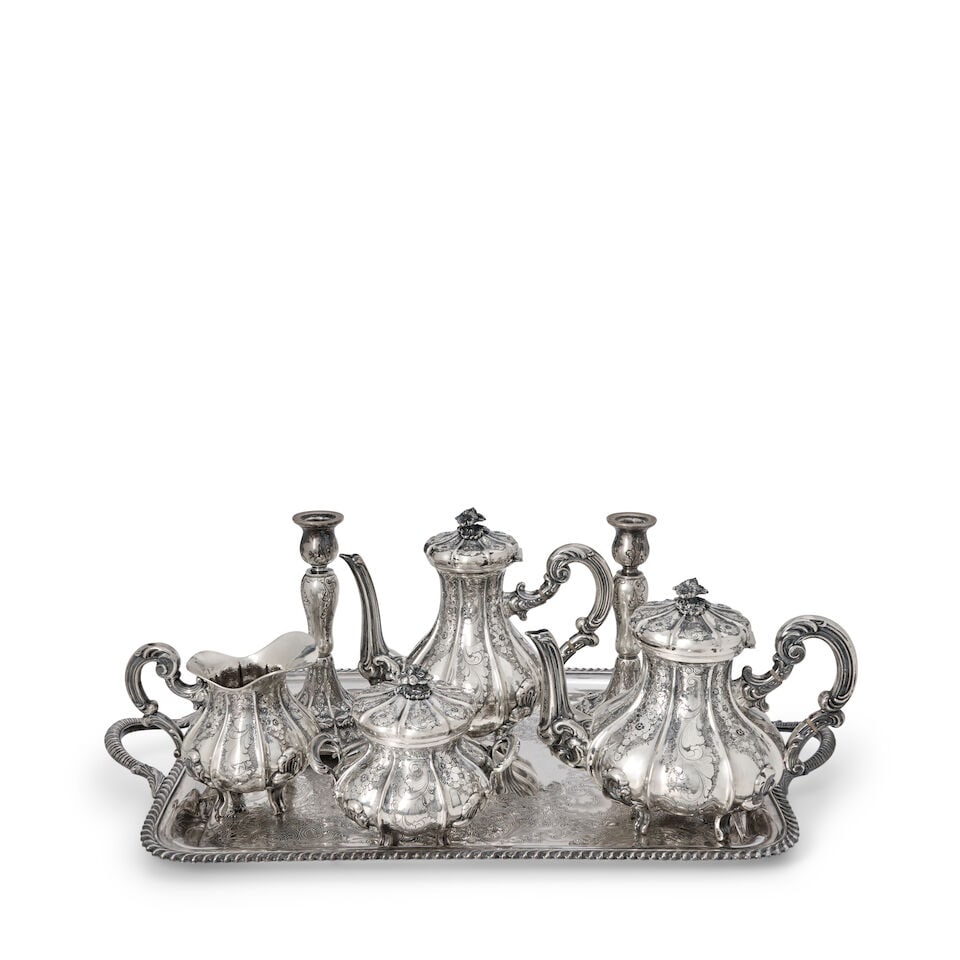 Italian .800 Silver Coffee and Tea Set,: Italian .800 Silver Coffee and Tea Set, Milan, 20th century, Torchiana & Loda, maker, of lobed construction, the bodies engraved with scrolled foliage and pendant flowerheads, includes coffeepot, ht. 