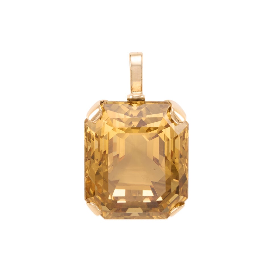14K GOLD AND CITRINE PENDANT: 14K GOLD AND CITRINE PENDANT • 14k yellow gold • 1 rectangular-shaped citrine weighing approximately 65.00 - 65.50 carat • Measures 1 1/4 x 7/8 in. • Estimated gross weight: