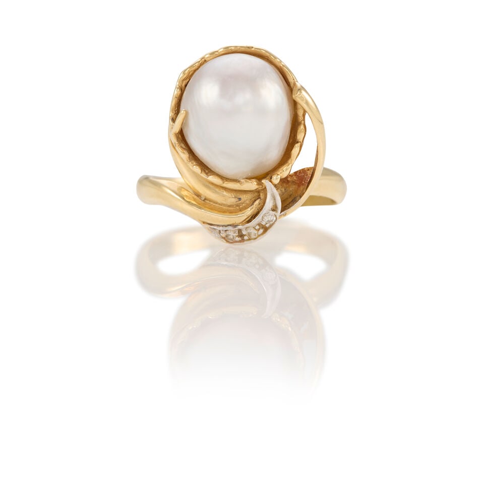 14K GOLD, CULTURED PEARL AND DIAMOND RING: 14K GOLD, CULTURED PEARL AND DIAMOND RING • 14k yellow and white gold • 3 round diamonds • 1 baroque cultured pearl measuring approximately 11.20mm in diameter • Size 7 3/4