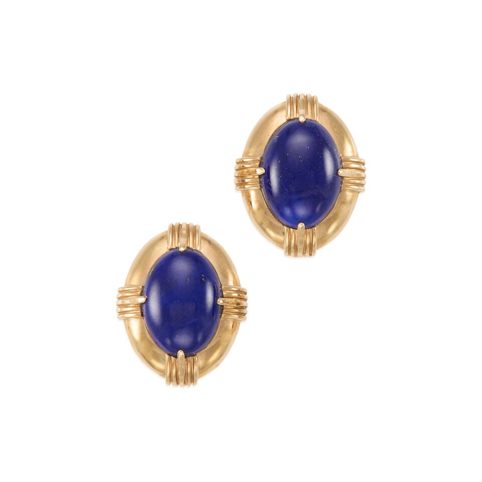 PAIR OF 14K GOLD AND LAPIS LAZULI EARCLIPS: PAIR OF 14K GOLD AND LAPIS LAZULI EARCLIPS • 14k yellow gold • 2 oval-shaped cabochon lapis lazuli measuring approximately 16.52mm x 12.70mm x 5.35mm • Measures 1 in. x 3/4