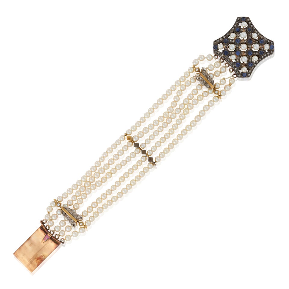 GOLD, SAPPHIRE, AND CULTURED PEARL BRACELET: GOLD, SAPPHIRE, AND CULTURED PEARL BRACELET • 12K and 14K gold • Numerous cultured pearls measuring approximately 3.80mm in diameter • Numerous round shaped sapphires weighing approx