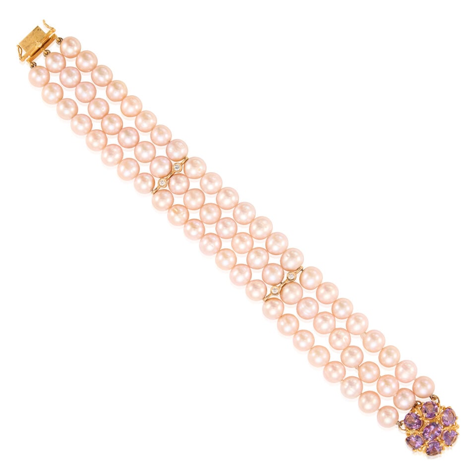 GOLD, CULTURED PEARL, AMETHYST, AND DIAMOND BRACELET: GOLD, CULTURED PEARL, AMETHYST, AND DIAMOND BRACELET • 12K and 14K yellow gold • Seven oval shaped amethysts measuring approximately 8.60mm x 6.07mm x depth cannot be determined due to