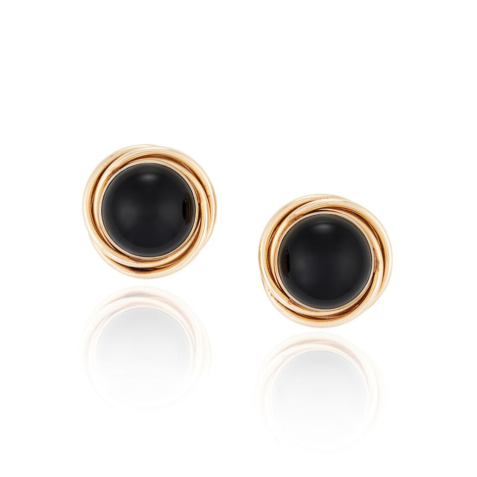 14K GOLD AND ONYX EARCLIPS: 14K GOLD AND ONYX EARCLIPS • 14K yellow gold • Two onyx cabochons measuring approximately 14.91mm x 14.91mm x 7.93mm • Measures 3/4 in. x 3/4 in. • Estimated gross weight: