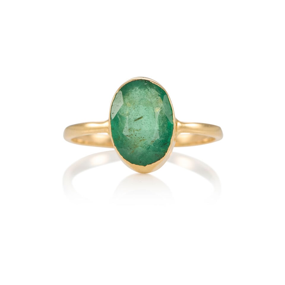 14K GOLD AND EMERALD RING: 14K GOLD AND EMERALD RING • 14K yellow gold • One oval shaped emerald weighing approximately 1.50 carats • Size 5 3/4 • Estimated gross weight: 1.7 grams Footnotes: Overall