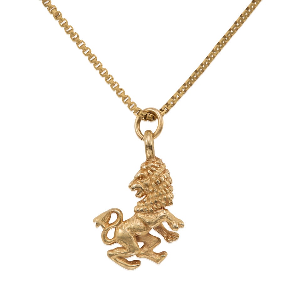 GOLD LION PENDANT NECKLACE: GOLD LION PENDANT NECKLACE • 18k yellow gold, 14k yellow gold pendant • Length 16 in., pendant measures 3/4 x 1/2 in. • Estimated gross weight: 5.7 grams Footnotes: Overall