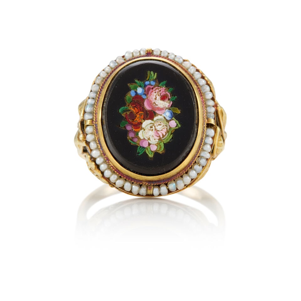 14K GOLD AND MICROMOSAIC RING: 14K GOLD AND MICROMOSAIC RING • 14K yellow gold • One micromosaic design on an oval shaped onyx measuring 16.00mm x 13.13mm x 3.34mm • Numerous drilled seed pearls • Size 8