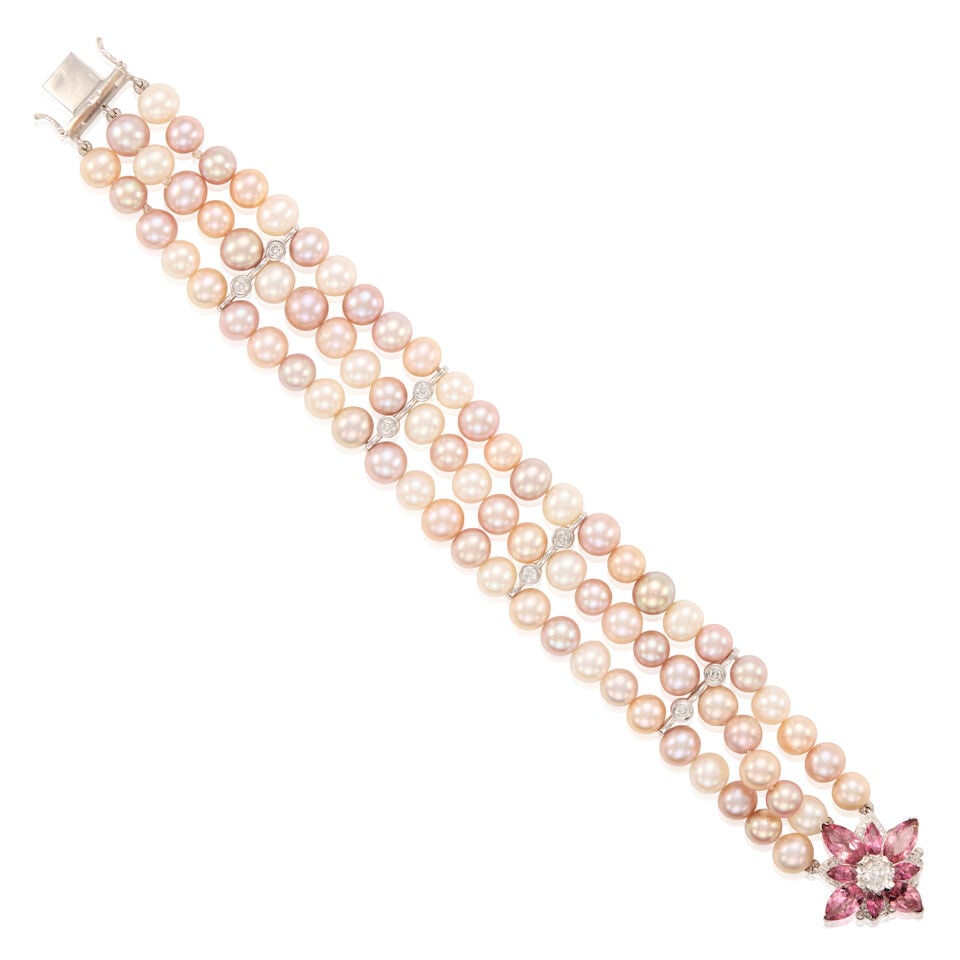 14K GOLD, CULTURED PEARL, TOURMALINE, AND DIAMOND BRACELET: 14K GOLD, CULTURED PEARL, TOURMALINE, AND DIAMOND BRACELET • 14K white gold • Numerous cultured pearls measuring approximately 7.79mm in diameter • Seven marquise shaped tourmalines