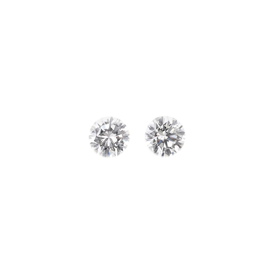TWO LOOSE DIAMONDS WITH GIA REPORT: TWO LOOSE DIAMONDS WITH GIA REPORT • 1 loose round diamond stated to weigh 0.54 carat • 1 loose round diamond stated to weigh 0.52 carat • Accompanied by GIA Diamond Dossier Report