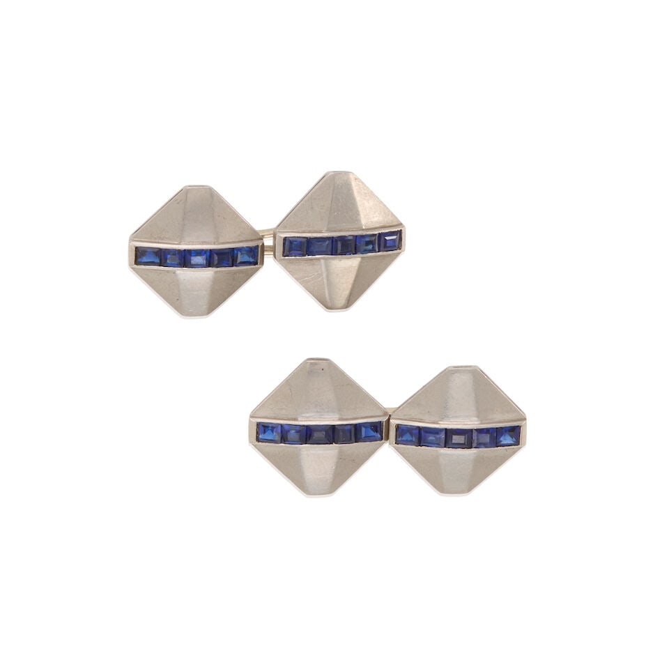 PLATINUM AND SAPPHIRE CUFFLINKS: PLATINUM AND SAPPHIRE CUFFLINKS • Platinum • Numerous square shaped sapphires weighing approximately 1.40 carats total • Measures 1 in. x 5/8 in. • Estimated gross weight: 13.7