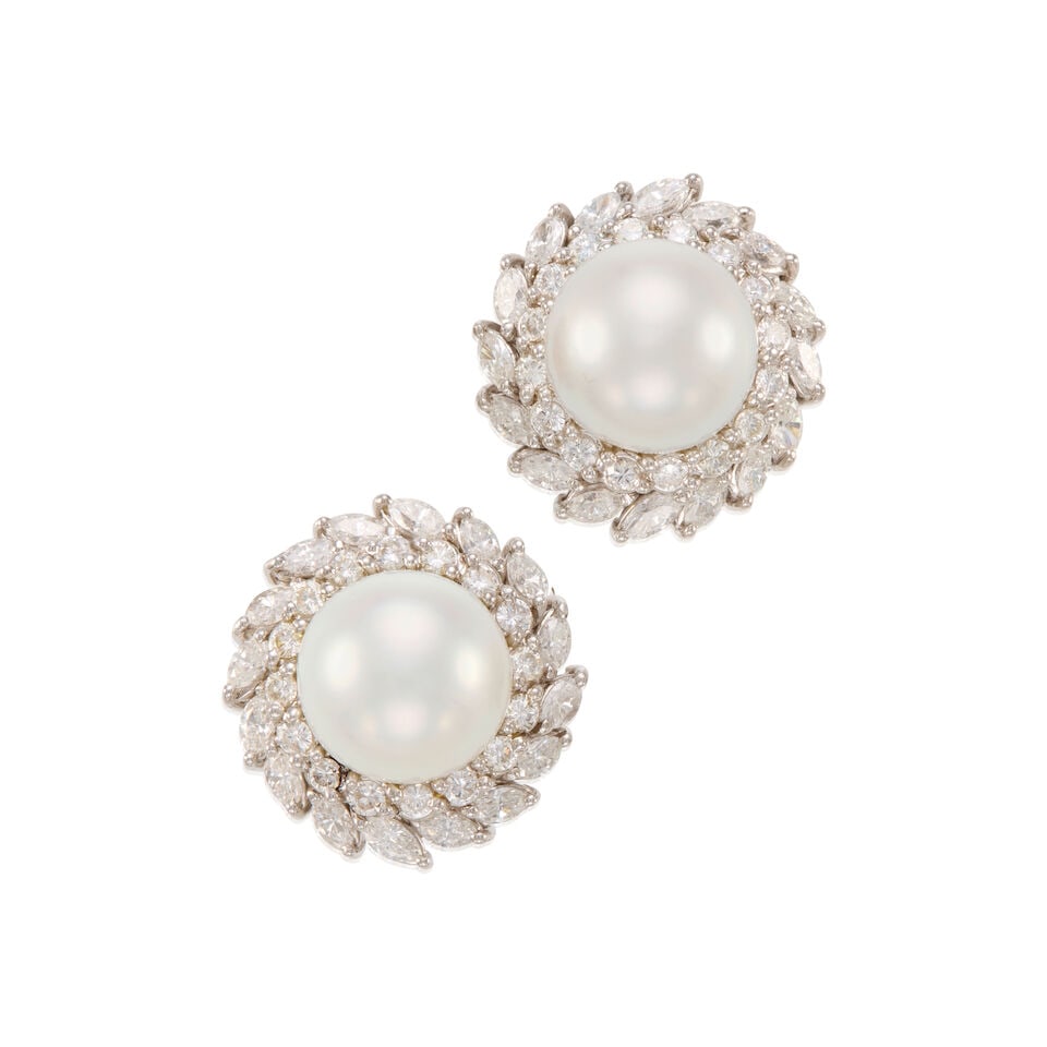 18K GOLD, CULTURED PEARL, AND DIAMOND EARRINGS: 18K GOLD, CULTURED PEARL, AND DIAMOND EARRINGS • 18K white gold • Two cultured pearls measuring approximately 12.63mm in diameter • Numerous round shaped diamonds weighing