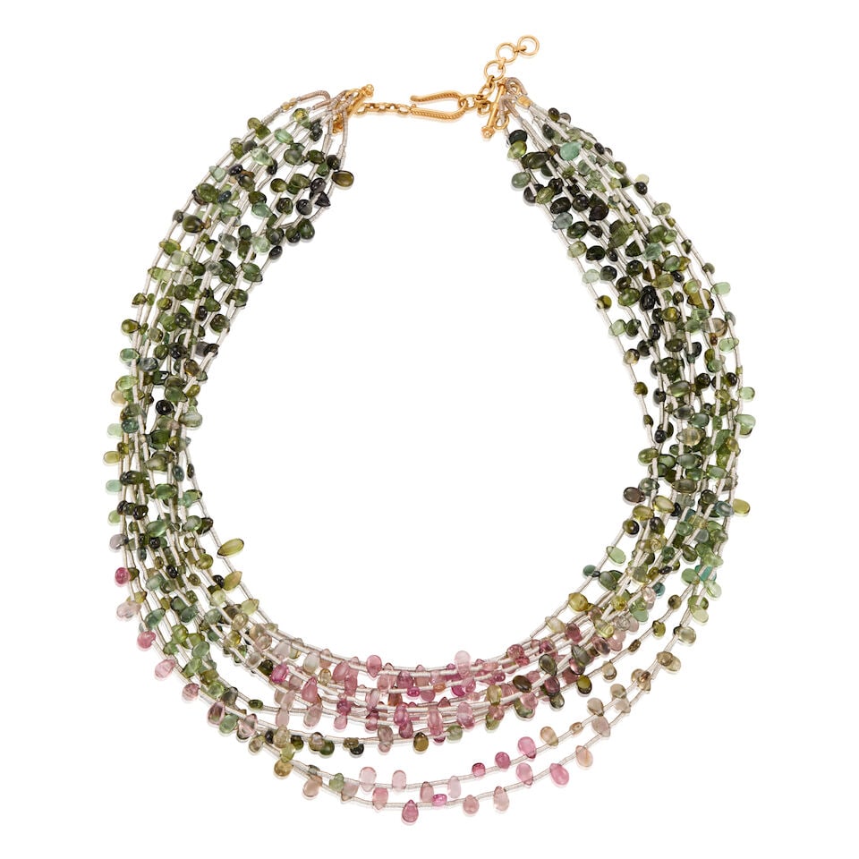 18K GOLD, METAL, AND TOURMALINE NECKLACE: 18K GOLD, METAL, AND TOURMALINE NECKLACE • 18K yellow gold • Numerous drilled pear-shaped tourmalines on a metal wire • Length 13 in. • Estimated gross weight: 48.1 grams Footn