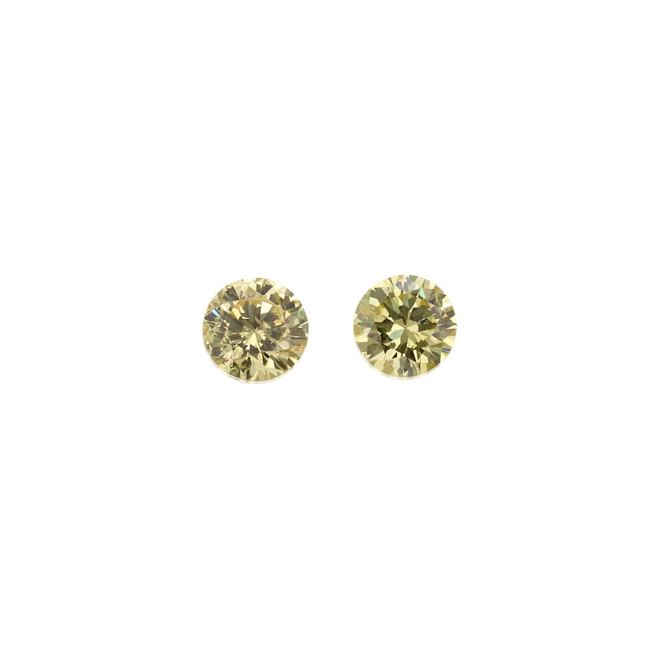 TWO LOOSE FANCY YELLOW DIAMONDS WITH GIA REPORTS: TWO LOOSE FANCY YELLOW DIAMONDS WITH GIA REPORTS • 1 loose round Fancy Light Yellow Diamond stated to weigh 0.71 carat • 1 loose round Fancy Light Yellow Diamond stated to weigh 0.62