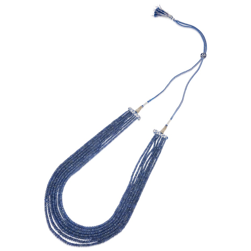 MULTI-STRAND SAPPHIRE BEAD NECKLACE: MULTI-STRAND SAPPHIRE BEAD NECKLACE • Woven thread and string • Numerous faceted and drilled beads of sapphire measuring approximately 3.19mm - 5.47mm in diameter • Length is