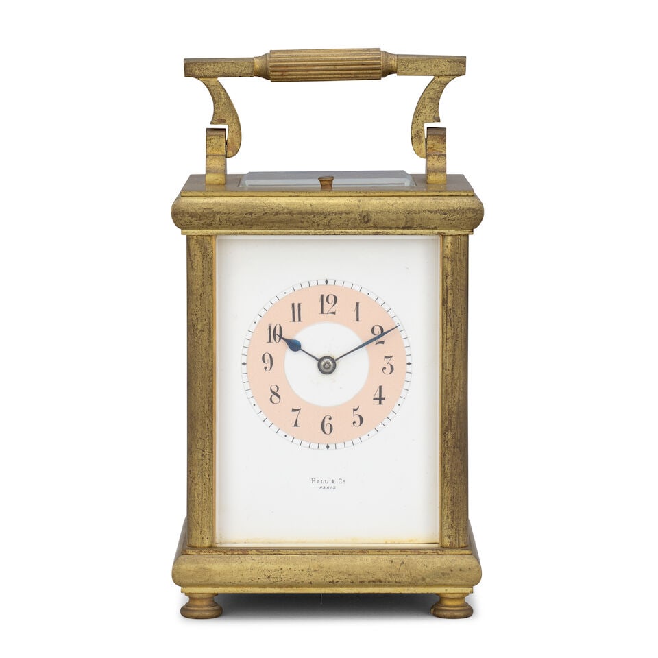 A early 20th century French striking and repeating carriage clock Hall & Co., Paris: A early 20th century French striking and repeating carriage clock Hall & Co., Paris The case surmounted by a brass carrying handle over a moulded top, with plain sides and a simple base resting on