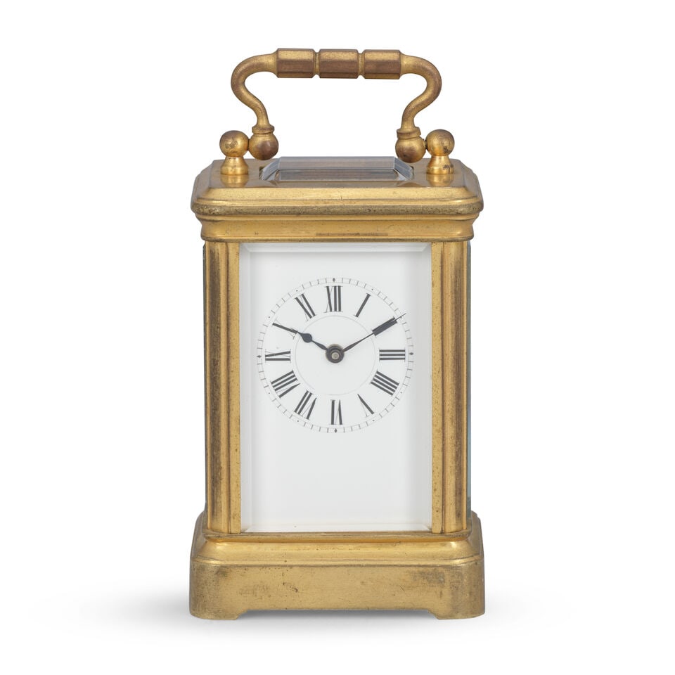A late 19th century French miniature carriage clock timepiece Henri Jacot, No. 9468: A late 19th century French miniature carriage clock timepiece Henri Jacot, No. 9468 The miniature case sumounted by a small brass carrying handle over an observation window with simple sides and