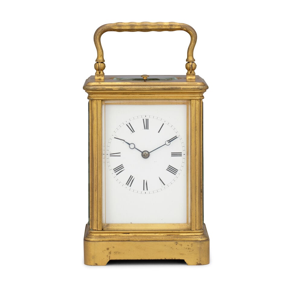 A late 19th century French striking and repeating carriage clock Drocourt number 19041: A late 19th century French striking and repeating carriage clock Drocourt number 19041 The case sumounted by a brass carrying handle over an oval observation window and repeat button to a moulded top 