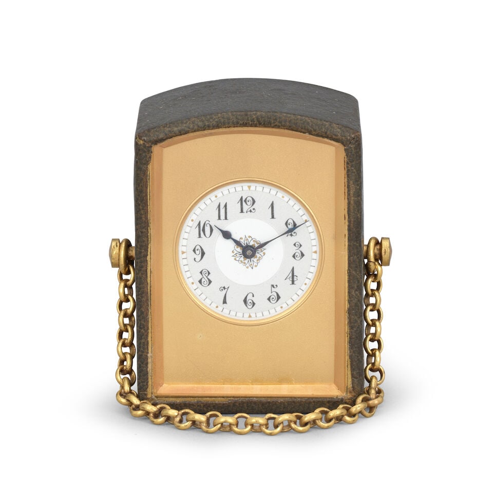A late 19th century French miniature carriage clock timepiece Margaine Paris, number 10860: A late 19th century French miniature carriage clock timepiece Margaine Paris, number 10860 The leather covered case with bevelled glass panels to the front and back and fine leather to the remainder