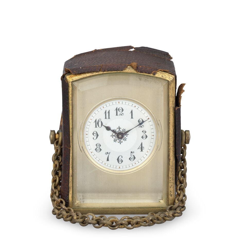 A late 19th century miniature carriage clock timepiece Margaine Paris, number 10250: A late 19th century miniature carriage clock timepiece Margaine Paris, number 10250 The leather covered case with bevelled glass panels to the front and back and leather to the remainder of the case w