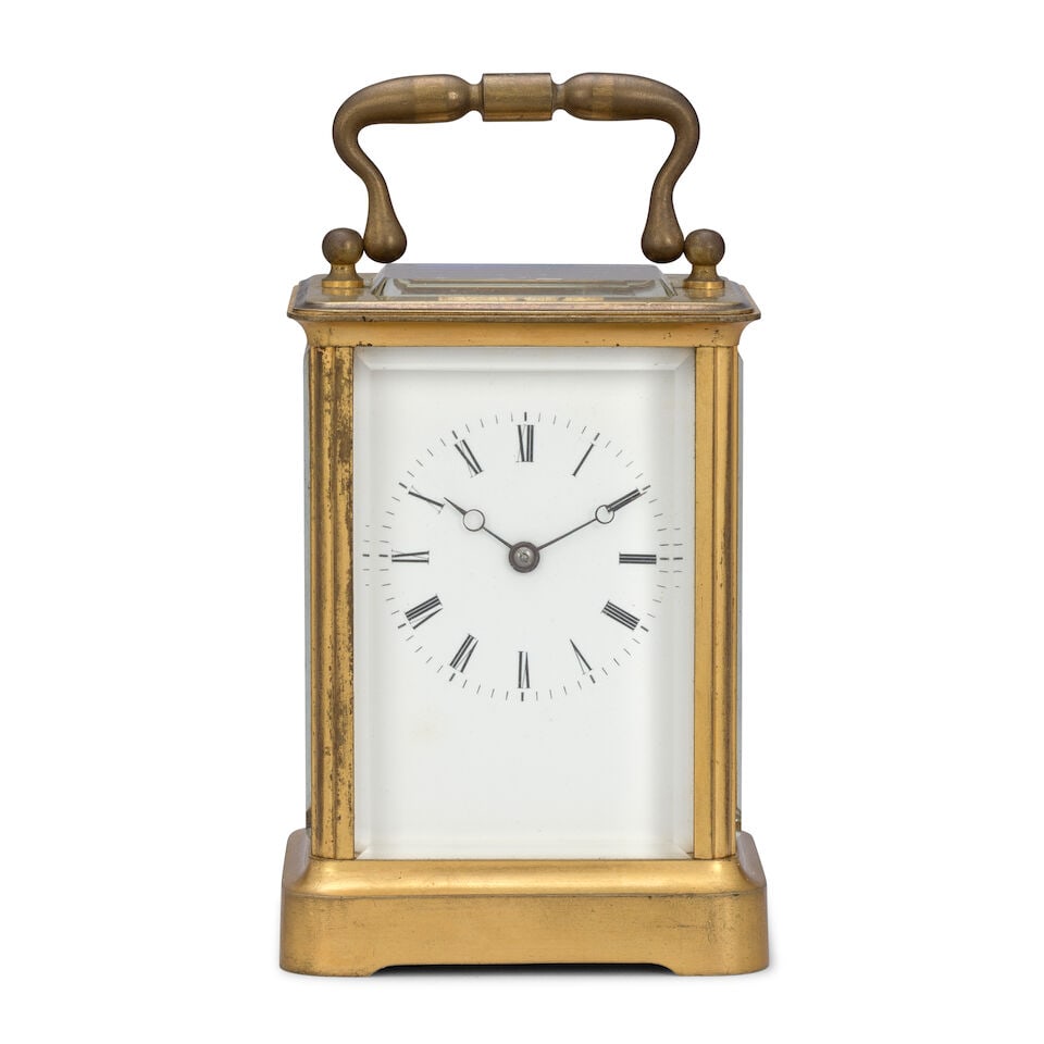 A mid 19th century French Striking carriage clock Japy Freres, number 334: A mid 19th century French Striking carriage clock Japy Freres, number 334 The case surmounted by a robust carrying handle over a bevelled glass observation window with simple sides and moulded base,
