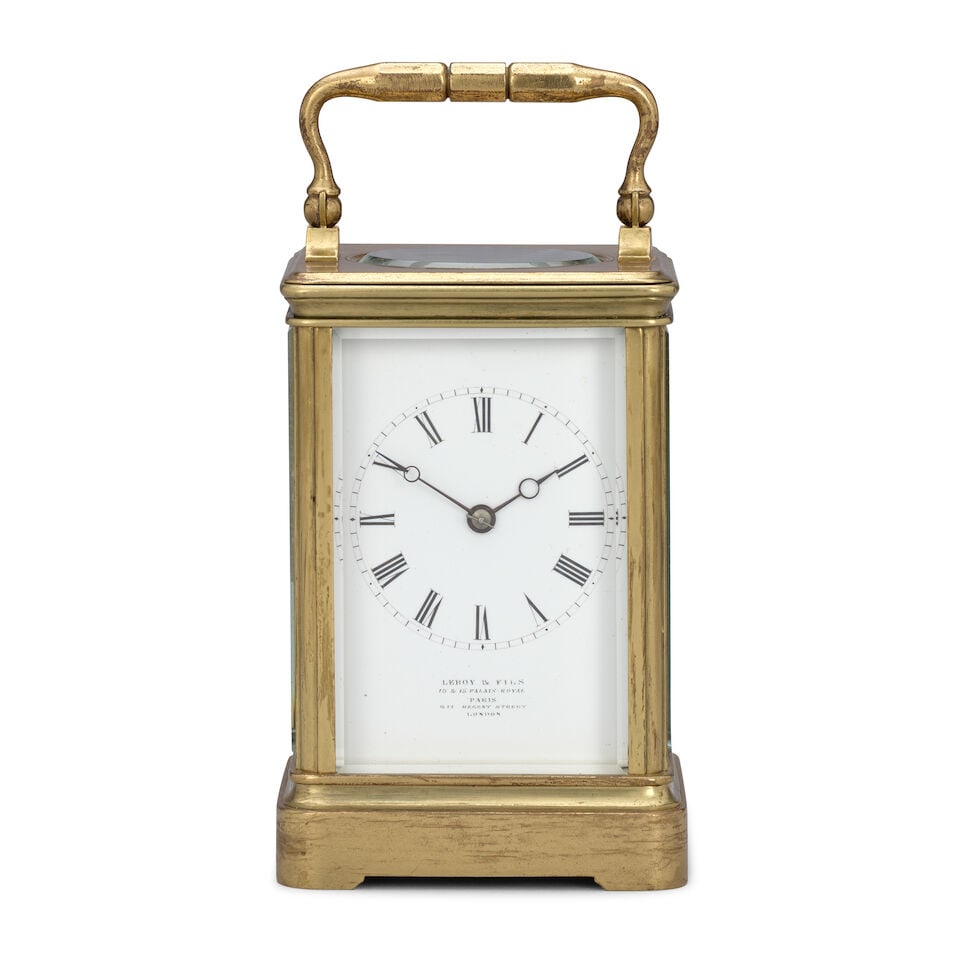 A late 19th century French carriage clock timepiece Le Roy & Fils, 13 & 15 Palais Royal, Paris,...: A late 19th century French carriage clock timepiece Le Roy & Fils, 13 & 15 Palais Royal, Paris, 211 Regent Street, London The case surmounted by a brass carrying handle over an oval observation