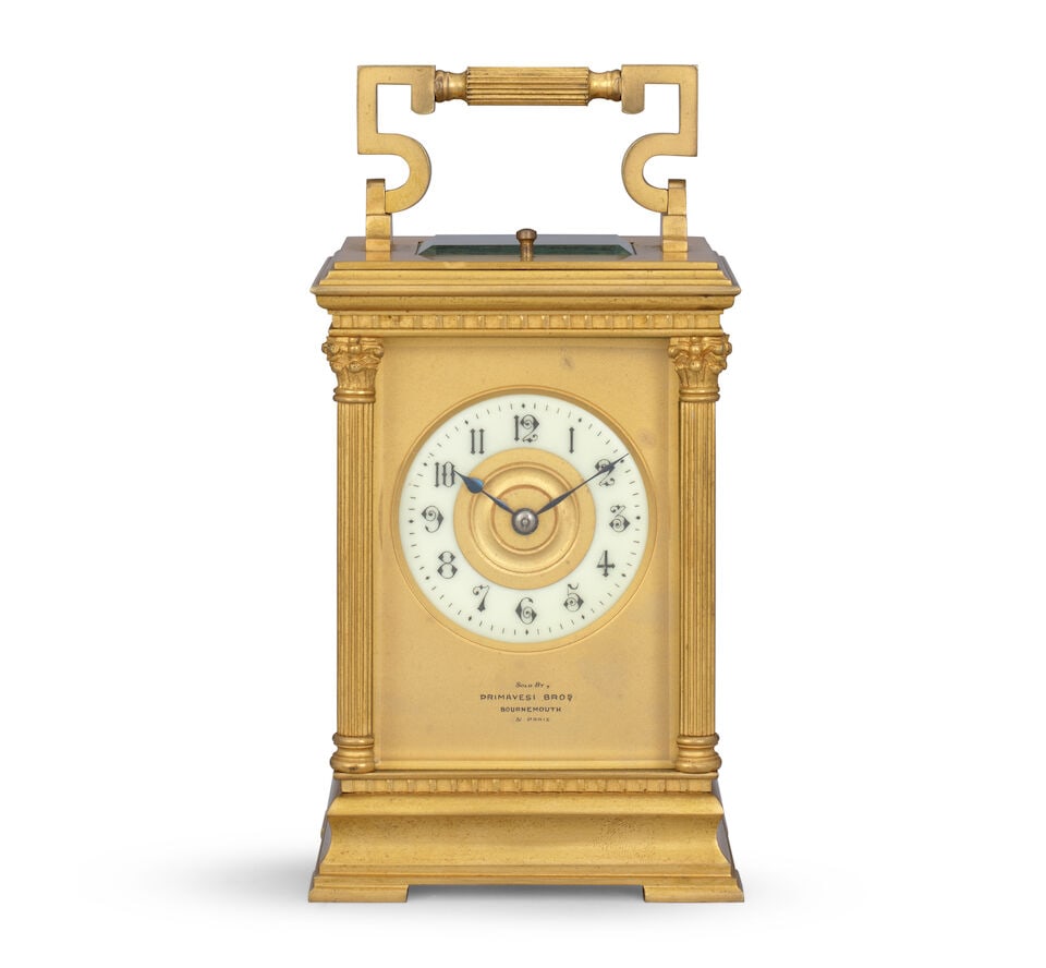 A late 19th century striking and repeating carriage clock with pillared case Primavesi Bros, Bou...: A late 19th century striking and repeating carriage clock with pillared case Primavesi Bros, Bournemouth and Paris The case surmounted by a shaped carrying handle over a bevelled glass observation win