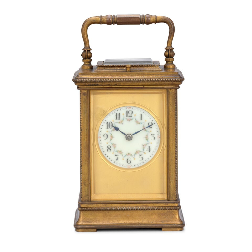 A late 19th century French striking and repeating carriage clock EGL, Paris: A late 19th century French striking and repeating carriage clock EGL, Paris The case sumounted by a shaped carrying handle over a small observation window with repeat button, to a decorated top with m
