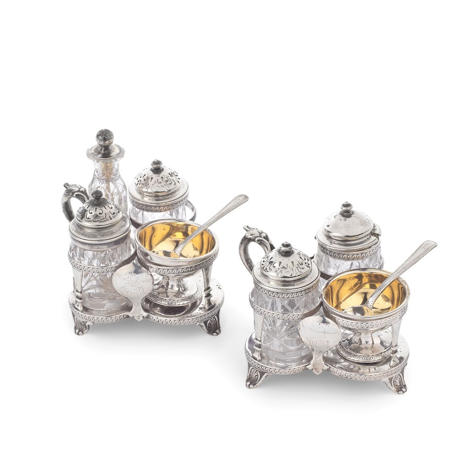 A pair of Victorian silver cruets Hunt & Roskell, London 1868, incuse stamped 'HUNT AND ROSKELL ...: A pair of Victorian silver cruets Hunt & Roskell, London 1868, incuse stamped 'HUNT AND ROSKELL / LATE / STORR & MORTIMER / 4964' A quatrefoil stand, with a decorative open frame for holding three