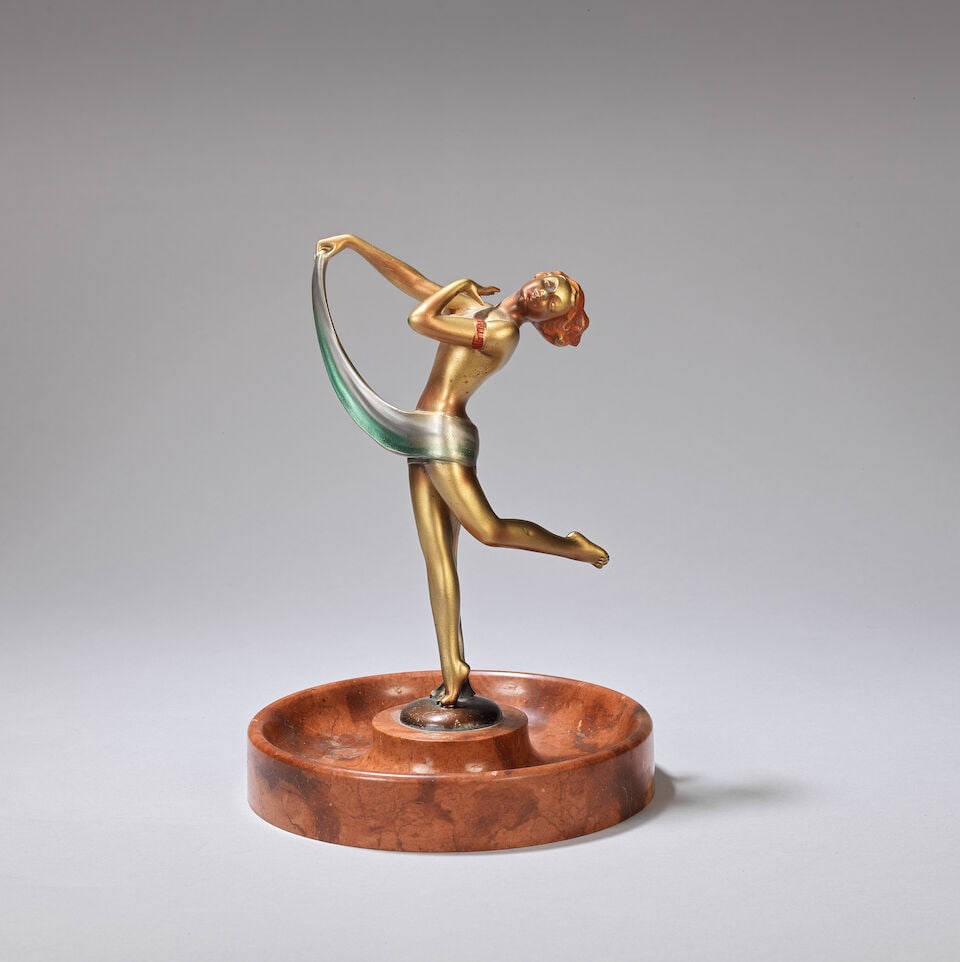 Josef Lorenzl (Austrian, 1892-1950) 'Scarf dancer' figural sculpture, circa 1930: Josef Lorenzl (Austrian, 1892-1950) 'Scarf dancer' figural sculpture, circa 1930 Bronze, cold-painted, gold with coloured details; on circular red/brown marble base. 22.5 cm