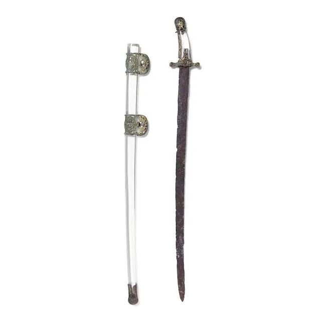 A rare Khazar sword with gilt-bronze hilt and scabbard mounts Caucasus, 9th/ 10th Century: A rare Khazar sword with gilt-bronze hilt and scabbard mounts Caucasus, 9th/ 10th Century the single-edged iron blade of slightly curved form, the gilt bronze hilt and scabbard mounts consisting of a 