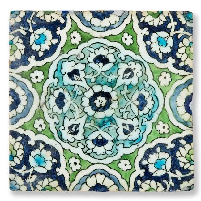 A Damascus underglaze-painted pottery tile Syria, last quarter of the 16th Century: A Damascus underglaze-painted pottery tile Syria, last quarter of the 16th Century of square form, decorated underglaze in cobalt blue, turquoise, green with black outline on a white ground with lobed