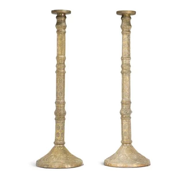 A monumental pair of post-Mamluk silver-inlaid brass Candlesticks from the Church of St. John th... (1 of 1)