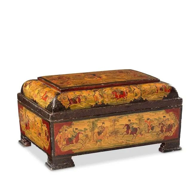 A large Qajar lacquer papier-mâché box depicting Fath 'Ali Shah and scenes from Yusuf ...: A large Qajar lacquer papier-mâché box depicting Fath 'Ali Shah and scenes from Yusuf and Zulaykha Persia, 19th Century of rectangular form on four feet, the lid with curved sides, decorated