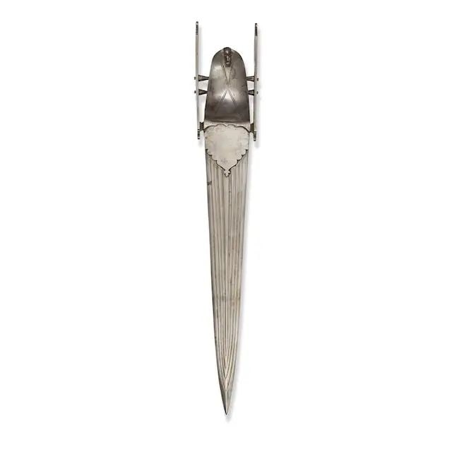 A steel push dagger (katar) Vijayanagara, 17th/ 18th Century: A steel push dagger (katar) Vijayanagara, 17th/ 18th Century the double-edged steel blade with eight fullers and armour piercing tip, the hilt of typical form with faceted baluster crossbars with sphe