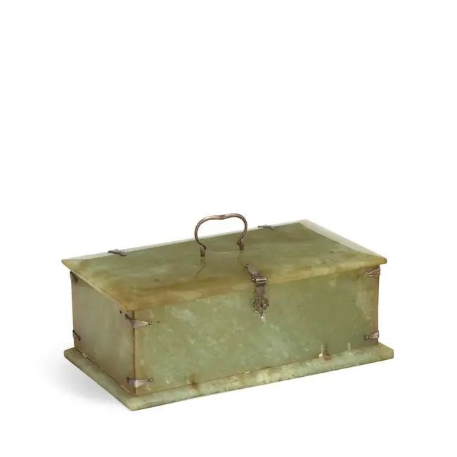 A Mughal silver-mounted bowenite box North India, 19th Century: A Mughal silver-mounted bowenite box North India, 19th Century of rectangular form with hinged lid and bevelled edges, silver mounts and handle with foliate motifs to latch 24.5 x 13.7 x 9.7 cm. Footn