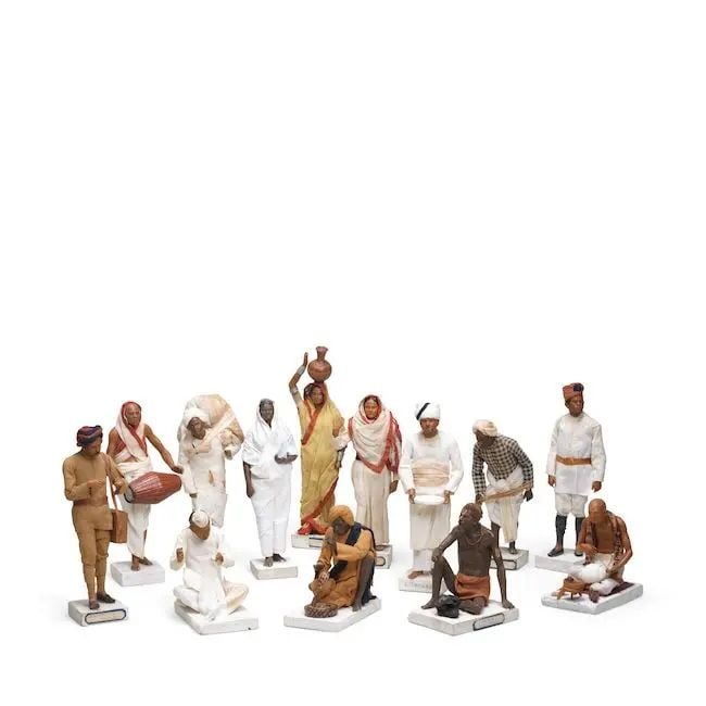 A group of thirteen clay figures of servants and tradespeople Krishnanagar, Bengal, late 19th/ e...: A group of thirteen clay figures of servants and tradespeople Krishnanagar, Bengal, late 19th/ early 20th Century decorated in polychrome, clothed and with accoutrements, on rectangular bases, includi