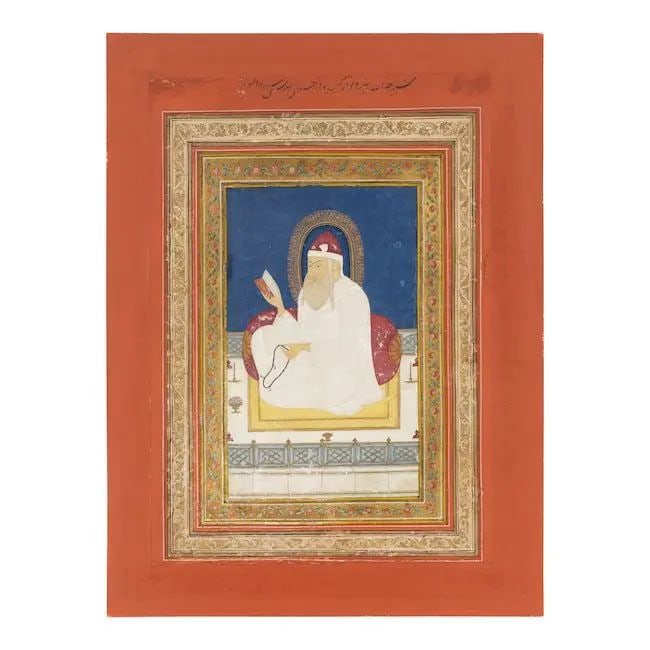 The sufi saint Khwaja Abu Hamir seated holding a manuscript of the Qur'an or a prayer book Decc...: The sufi saint Khwaja Abu Hamir seated holding a manuscript of the Qur'an or a prayer book Deccan, Hyderabad, circa 1780 gouache and gold on paper, illuminated floral inner borders, red-orange outer b