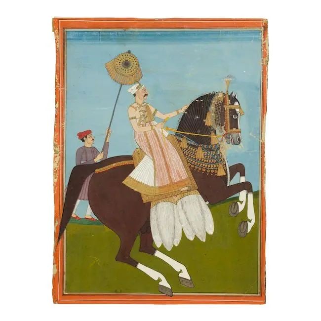 Rajah Chandu Lal Bahadur, minister to Nizam Sikander Jah of Hyderabad, riding a richly-caparison...: Rajah Chandu Lal Bahadur, minister to Nizam Sikander Jah of Hyderabad, riding a richly-caparisoned horse, accompanied by an attendant on foot holding a parasol Deccan, Hyderabad, early 19th Century go